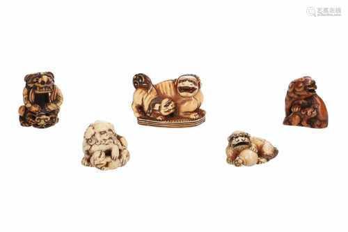 Lot of three netsuke and one okimono netsuke, 1) Ivory okimono netsuke, seven lucky gods in a