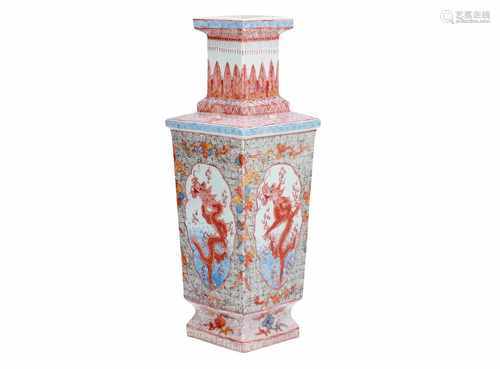 A polychrome porcelain vase, decorated with flowers and dragons. Marked with seal mark Qianlong.