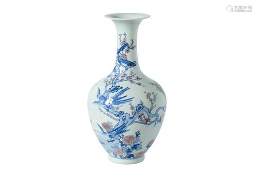 A blue and white with underglaze red porcelain vase, decorated with birds in a tree. Marked with 6-