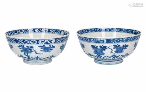 A pair of blue and white porcelain bowls with floral decor. Marked Shuanshu. China, Kangxi. Diam. 20