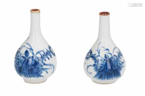 A pair of blue and white porcelain sprinkler vases, decorated with flowers. Unmarked. China, Kangxi.