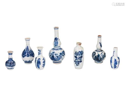 Lot of seven blue and white porcelain miniature vases, decorated with figures and flowers. Unmarked.