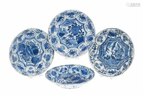 A lot of four blue and white 'kraak' porcelain dishes, decorated with flowers and birds. Unmarked.