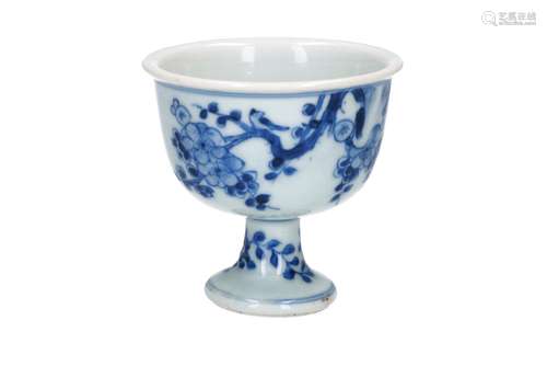 A blue and white porcelain stem cup, decorated with flowers, bird and butterfly. Unmarked. China,