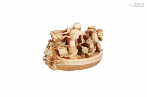 An ivory netsuke of karako riding an elephant. Signed Masamitsu. Japan, 19th century. H. 3,5 cm.