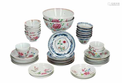 A lot of two polychrome porcelain bowls, 19 cups and 24 saucers with floral decor. Unmarked.