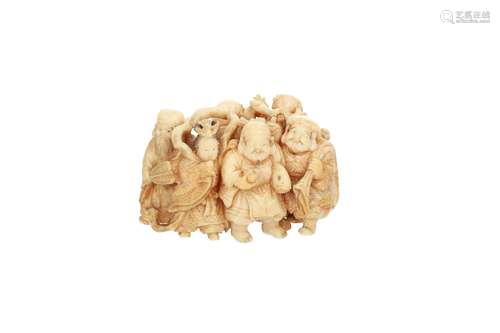 Ivory netsuke okimono of a takarabune with the seven lucky gods. Partly with inlay. Signed Shugyoku.