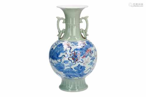 A celadon, blue and underglaze red porcelain vase, decorated with Fo-dogs with ball. Marked with