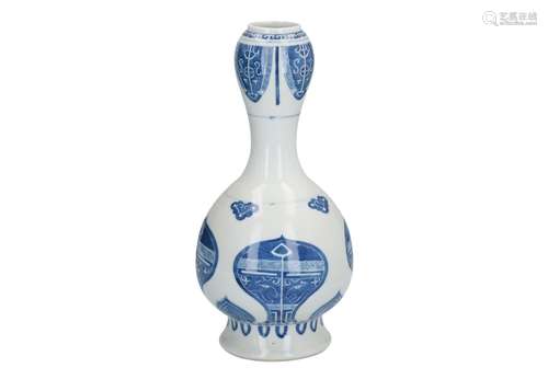 A blue and white porcelain garlic head vase, decorated symmetrically with flowers, ruyi and flower