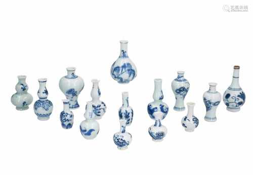 Lot of 15 blue and white porcelain miniature vases with floral decor. Unmarked. China, Kangxi. H.