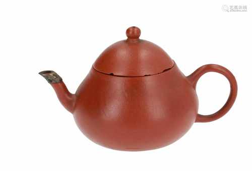 A small Yixing teapot with silver mounting. Marked with 8-character mark Gu Jing Zhou. China, 20th