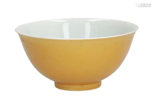 A yellow glazed porcelain bowl. Marked with seal mark Qianlong. China, 20th century. Diam. 13 cm.