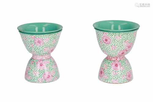 A pair of polychrome Yixing stem cups with loose inner cups, with floral decor. Unmarked. China,