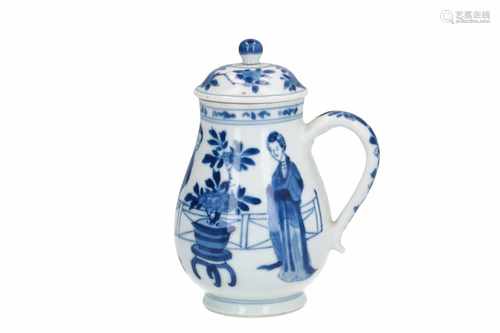 A blue and white porcelain lidded jug, decorated with long Elizas, fruits, flowers and