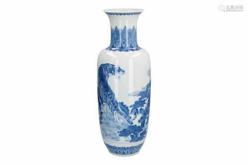 A blue and white porcelain vase, decorated with a tiger in landscape. Marked with seal mark.