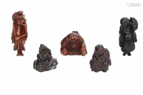 Lot of five netsuke, 1) Wooden Gama Sennin on toad. Signed. H. 4,5 cm. 2) Wooden Gama Sennin with