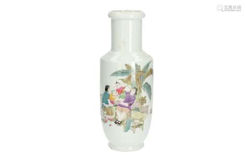 A polychrome porcelain rouleau vase with a decor of two ladies with playing boys in a garden. Marked