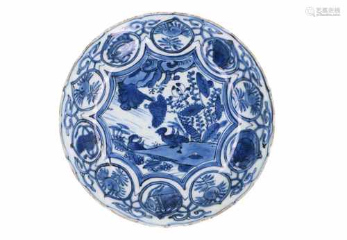 A blue and white porcelain dish, decorated with peaches and water birds. Unmarked. China, Wanli.