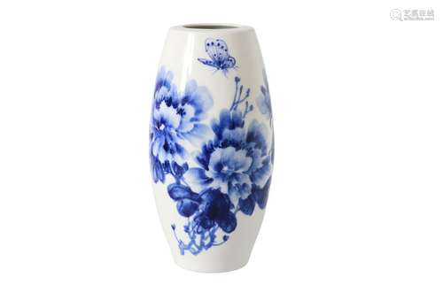 A blue and white porcelain vase, decorated with flowers and characters. Dated 1997. Signed Hua