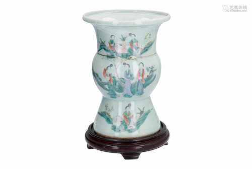 A polychrome porcelain vase on wooden base, decorated with long Elizas and butterflies. Unmarked.