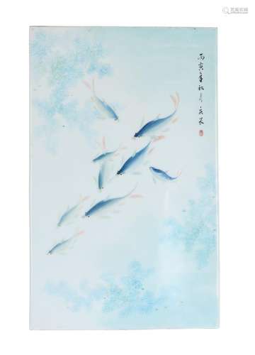 A polychrome porcelain plaque, decorated with fish. Dated 1986. Signed Chen Qing Chang (1933).