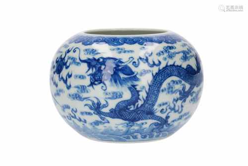 A blue and white porcelain jar, decorated with dragons, phoenix and burning pearl. Marked with