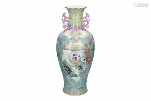 A polychrome porcelain vase with two handles, decorated with figures in cartouches, flowers and a