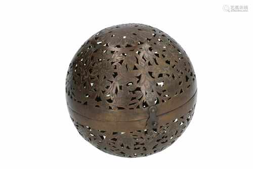 A messing spherical censer, entirely in openwork with floral decor. Can be flipped open and