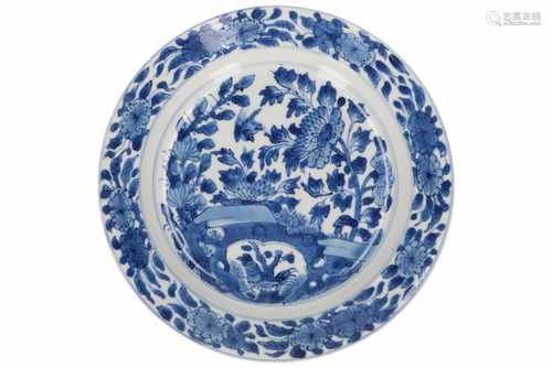 A blue and white porcelain dish, decorated with birds and flowers. Marked with 4-character mark