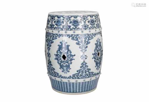 A blue and white porcelain garden seat, decorated with flowers and butterflies. China, ca. 1960.