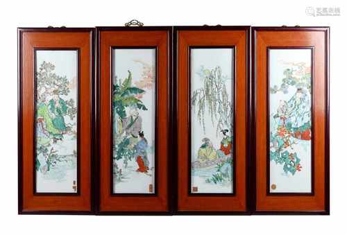 Lot of four rectangular polychrome porcelain plaques in wooden frames, all depicting scenes with