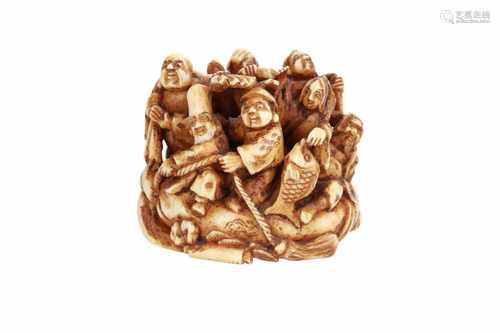 Ivory netsuke okimono of the seven lucky gods on a bag. Signed. Japan, 19th century. H. 4 cm. Please