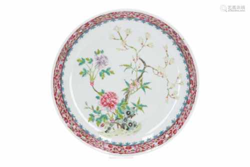 A polychrome porcelain dish, decorated with flowers. Marked with 4-character mark Hongxian. China,