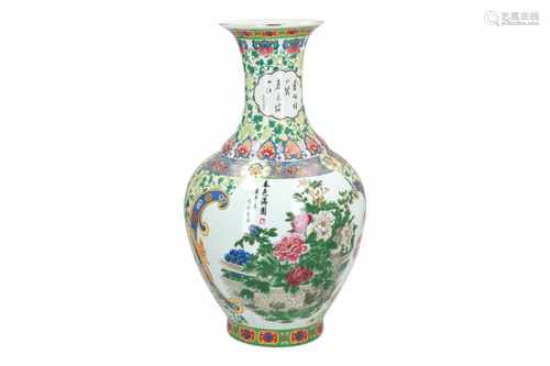 A transfer printed polychrome porcelain vase, decorated with cats, flowers and characters. Unmarked.