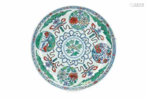 A Doucai porcelain dish, decorated with floral design and bats. Marked with seal mark Jiaqing.