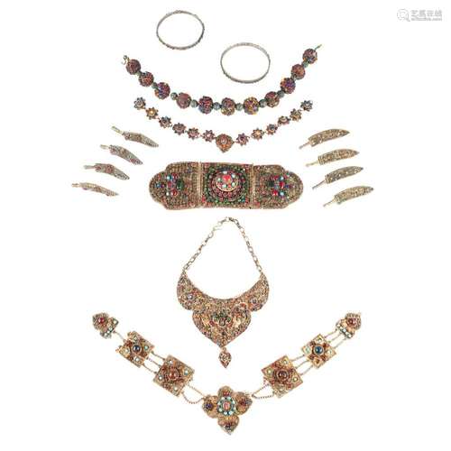 COLLECTION OF HARDSTONE AND GLASS INLAID HIMALAYAN JEWELLERY LATE 19TH/EARLY 20TH CENTURY largest 24cm long