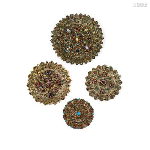 FOUR HARDSTONE AND GLASS INLAID HIMALAYAN ORNAMENTAL PLATES 19TH CENTURY largest 18.3cm wide