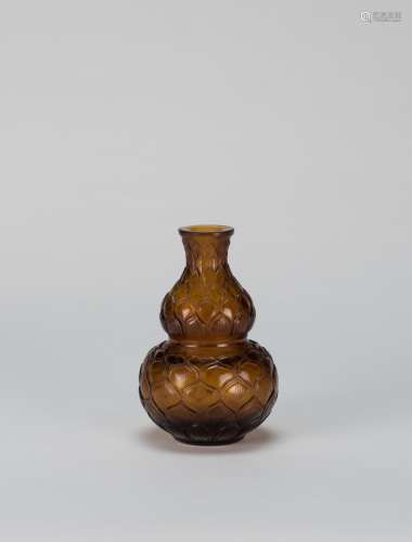 Qing-A Brown Glass Gourd’Qianlong Nian Zhi’ Mark