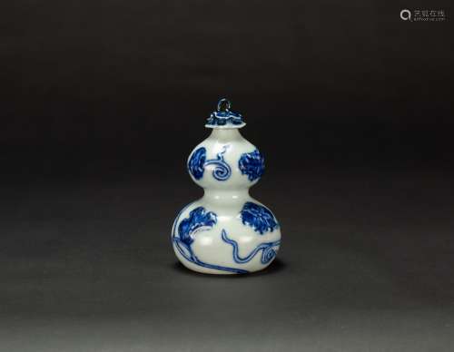 Qing-A Blue And White ‘Floral’Gourd Shape Vase And Cover