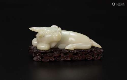 Late Qing-A White Jade Ox ,’Qianlong Nian Zhi ‘ Mark with Wood Stand