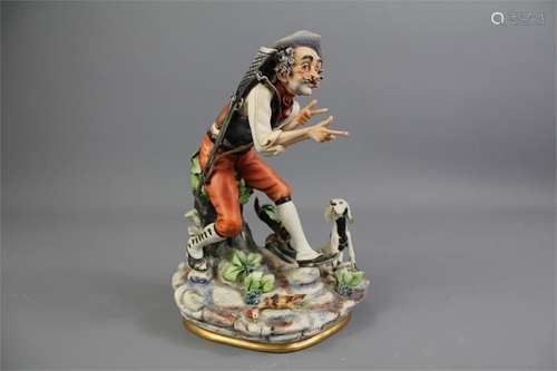 A Capo di Monte Porcelain Figure