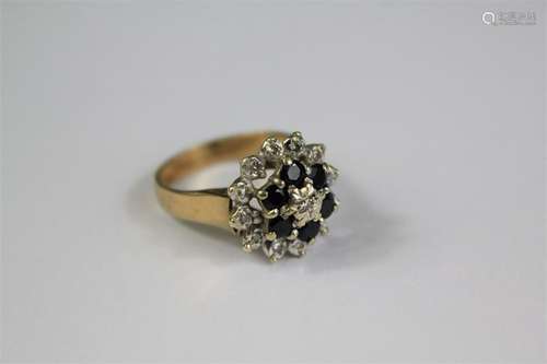 A 9ct Gold Sapphire and Diamond Floral Ring