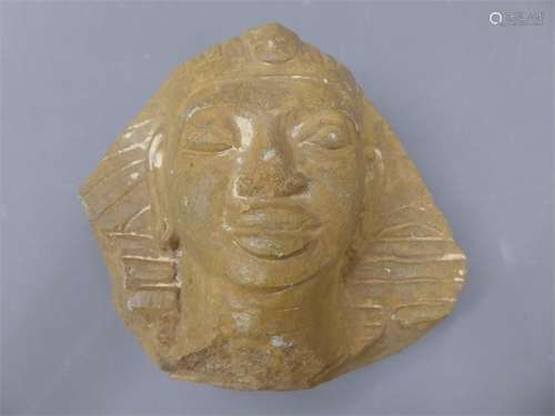 An Egyptian Rough-Hewn Red Stone Carving