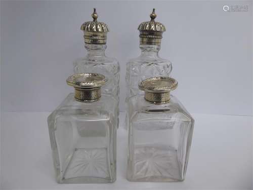 Four Edwardian Cut Glass Vanity Bottles