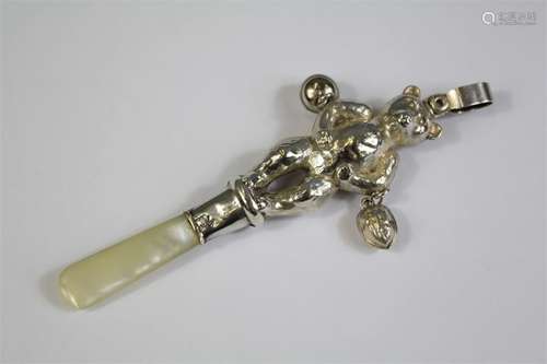 An Edwardian Silver and Mother of Pearl Rattle