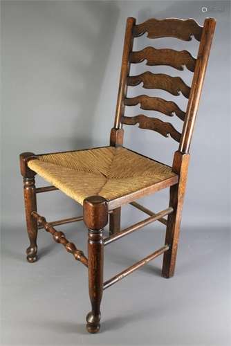 Eight Antique Ladder Back Chairs.