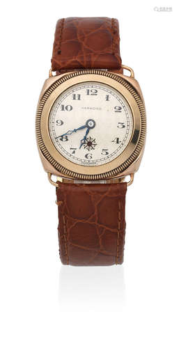 London Import mark for 1929  Harwood. A 9K gold automatic cushion form wristwatch