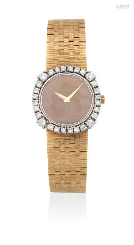 London Import mark for 1969  Chopard for Kutchinsky. A lady's 18K gold and diamond set manual wind bracelet watch with tiger's eye dial