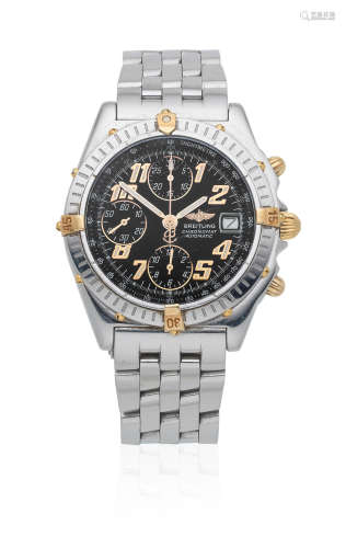 Chronomat, Ref: B13350, Sold 23rd November 2000  Breitling. A stainless steel and gold automatic calendar chronograph bracelet watch