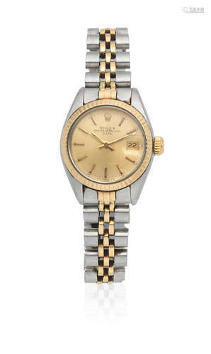 Date, Ref: 6917, Circa 1975  Rolex. A lady's stainless steel and gold automatic calendar bracelet watch